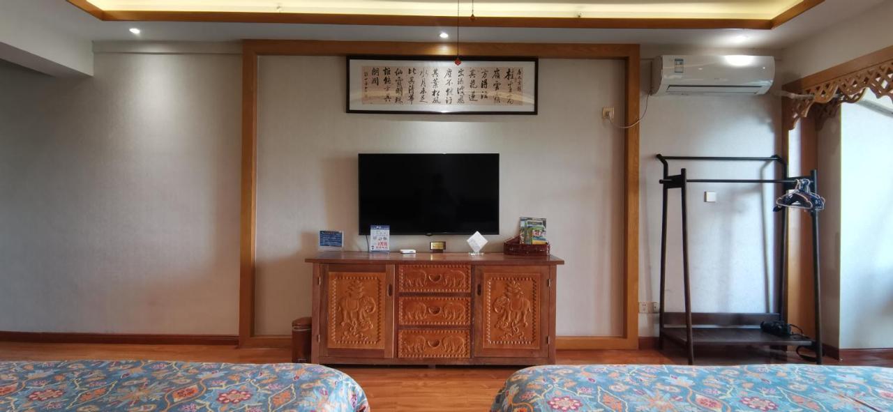 Doudou Meilan Fengqing Inn Jinghong Exterior photo