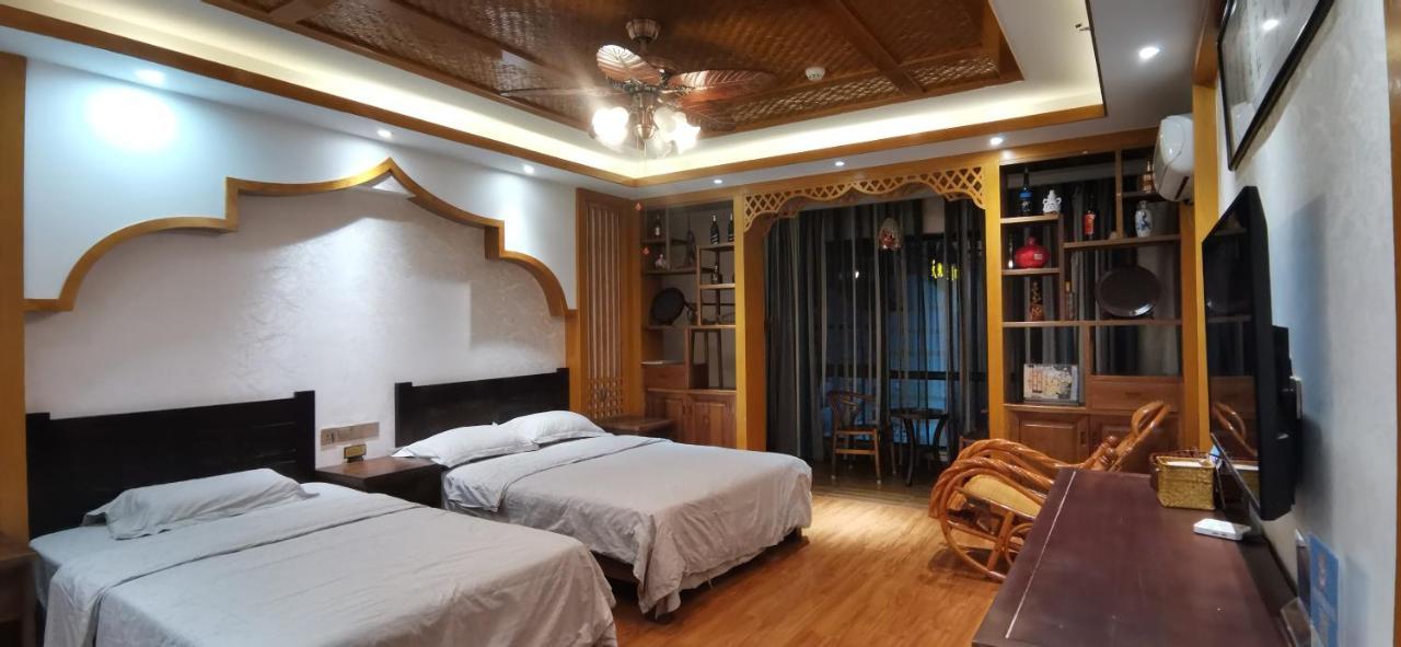 Doudou Meilan Fengqing Inn Jinghong Exterior photo